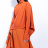 ORANGE DRAPED JUMPER 