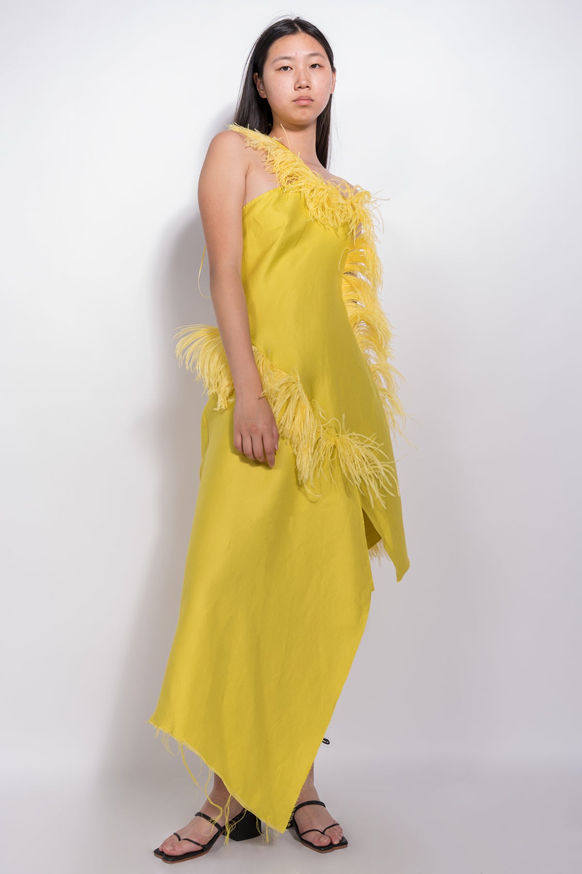 YELLOW ASYMMETRIC DRESS WITH FEATHERS