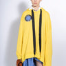 YELLOW ASYMMETRIC HOODIE WITH BIG EYELET marques almeida