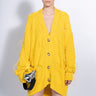 YELLOW OVERSIZED CARDIGAN WITH FEATHERS PULLS marques almeida